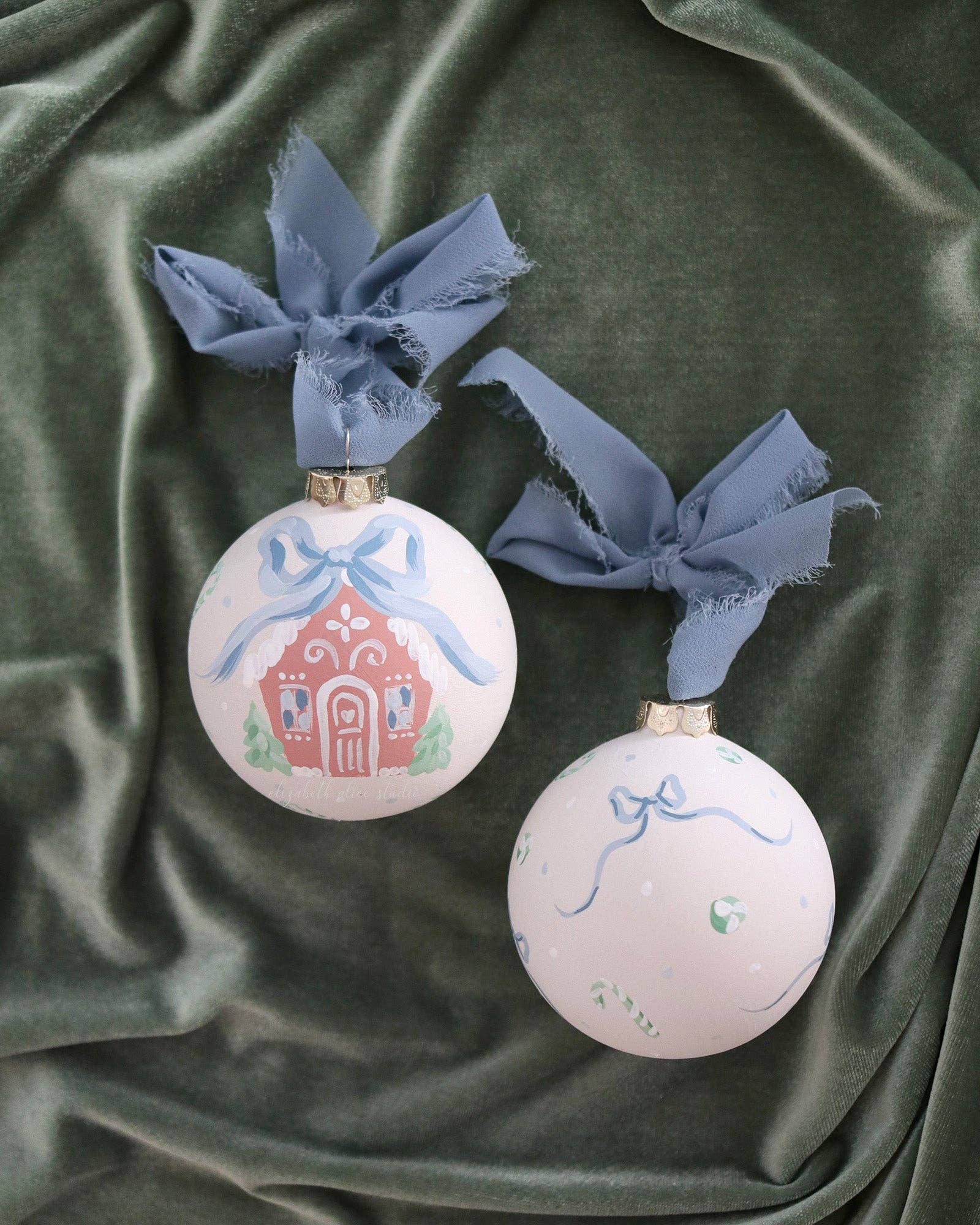 Blue gingerbread house hand-painted ornament: No year (bows and candy on reverse)