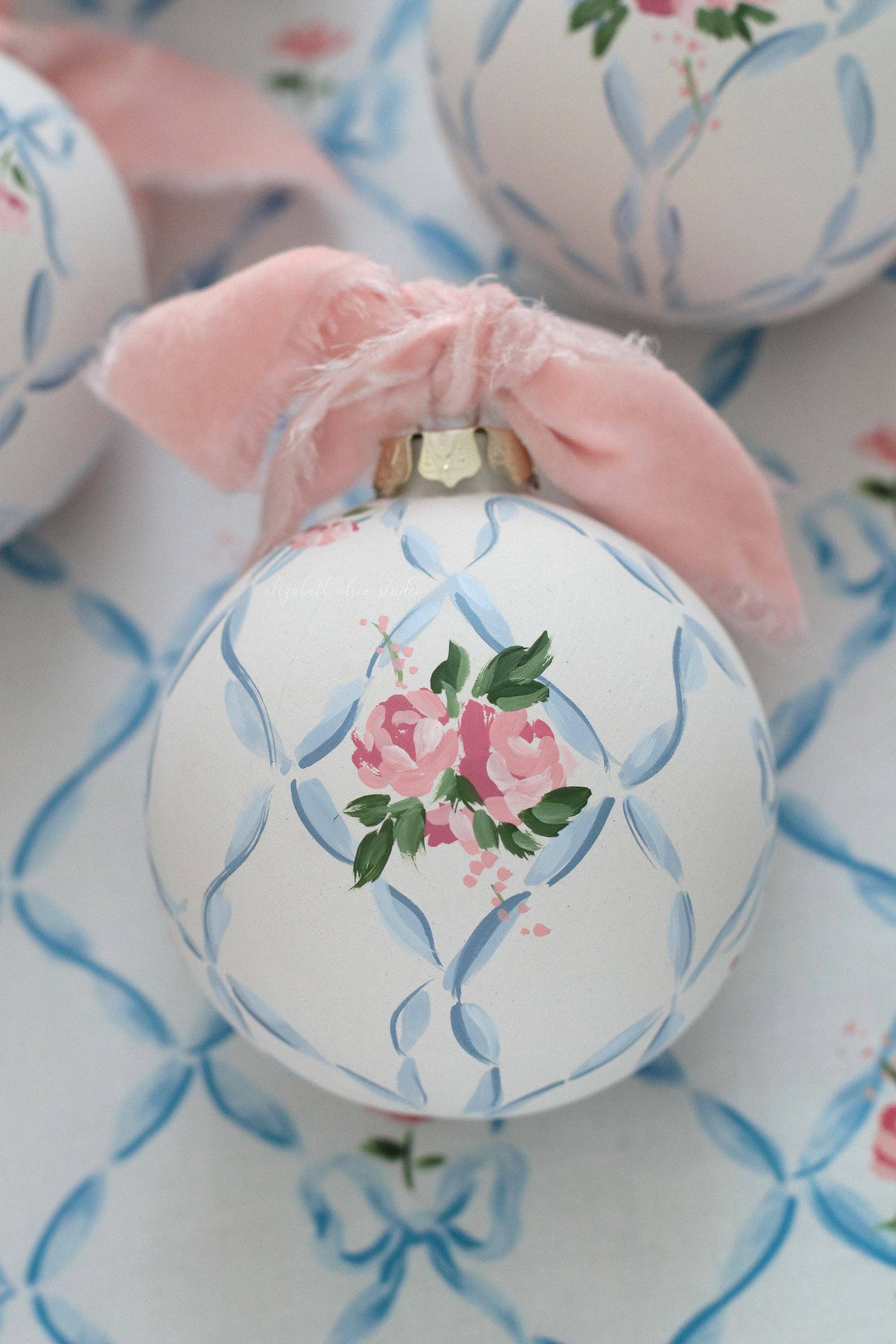 Ribbon trellis and rose hand-painted ornament