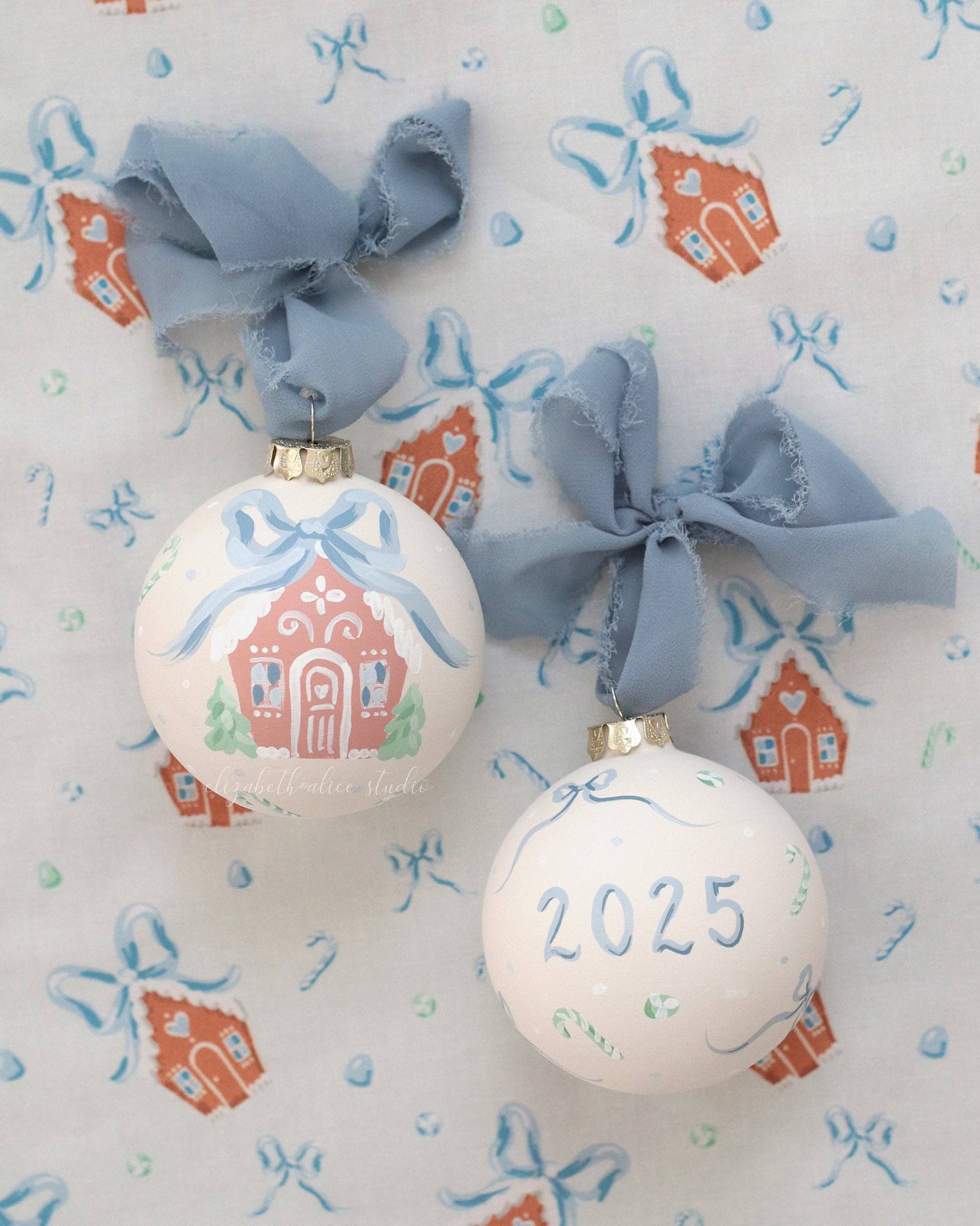 Blue gingerbread house hand-painted ornament: No year (bows and candy on reverse)