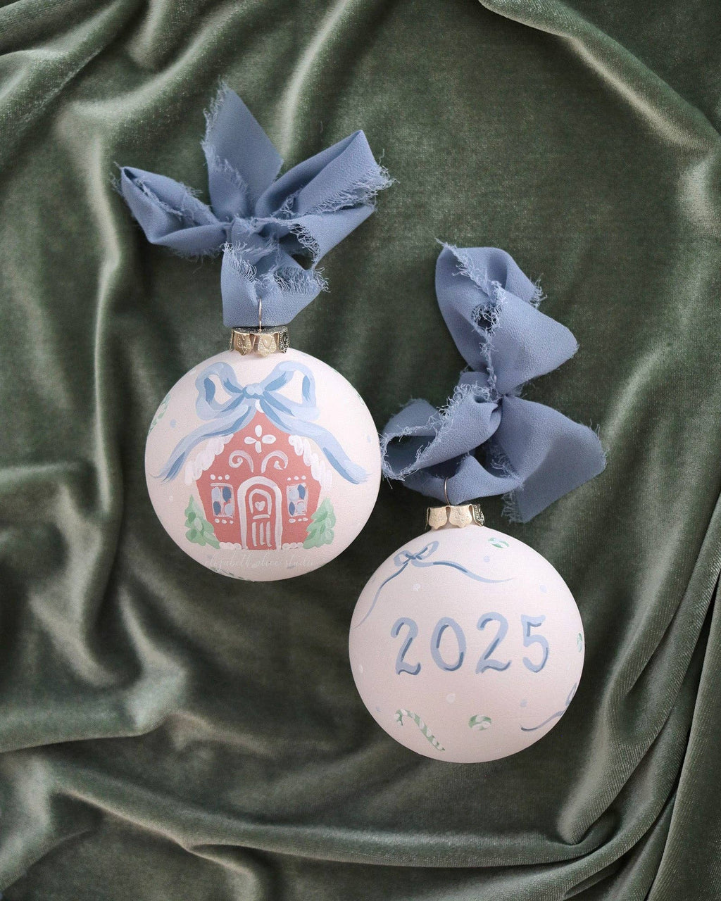 Blue gingerbread house hand-painted ornament: No year (bows and candy on reverse)