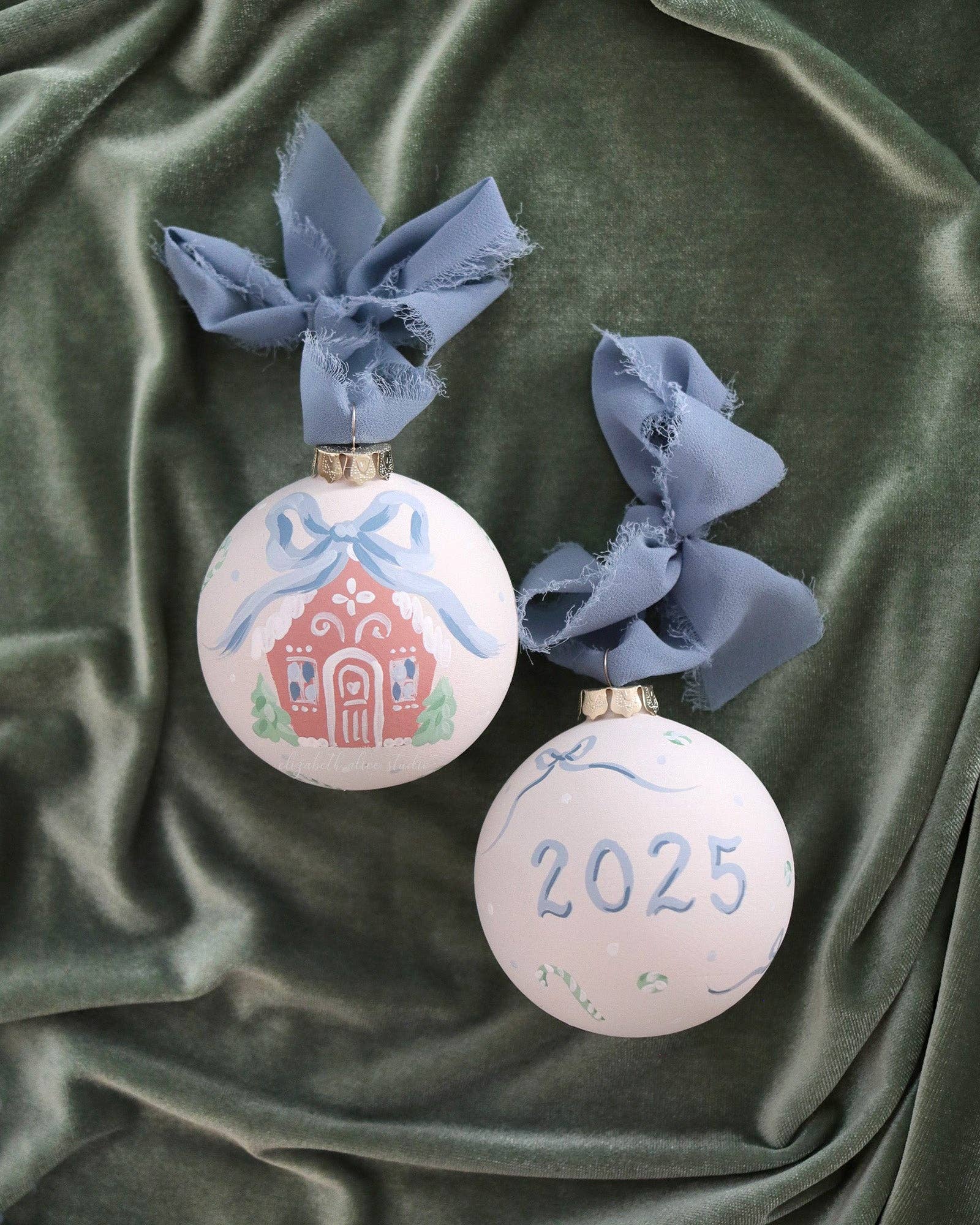Blue gingerbread house hand-painted ornament: No year (bows and candy on reverse)