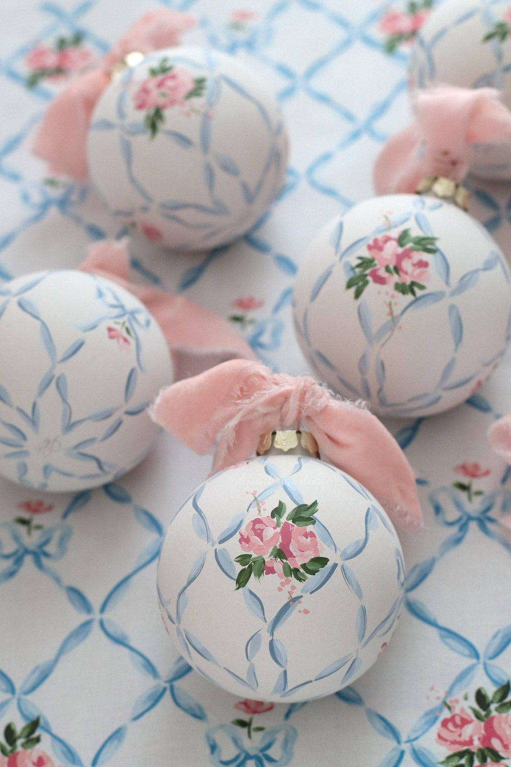 Ribbon trellis and rose hand-painted ornament