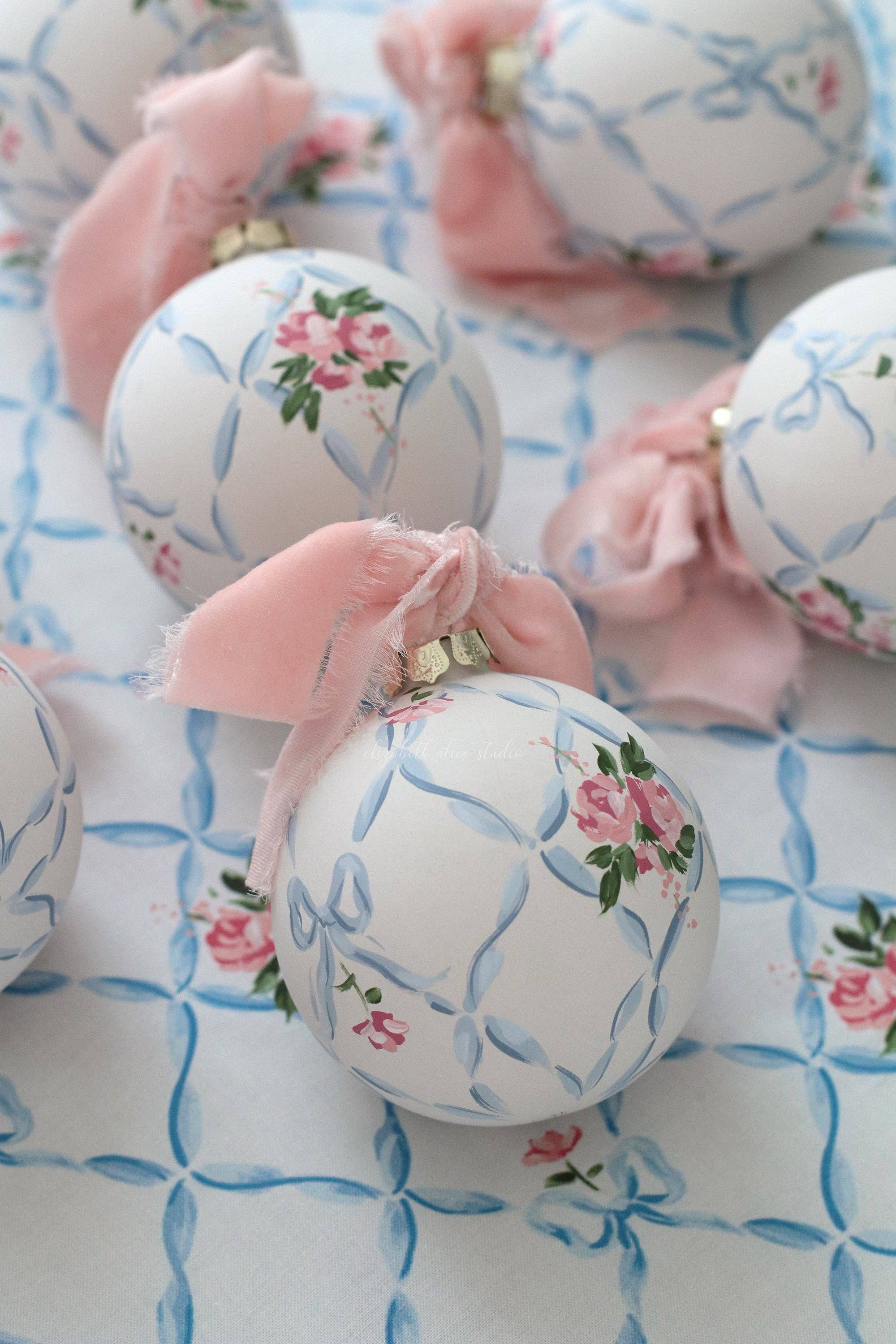 Ribbon trellis and rose hand-painted ornament