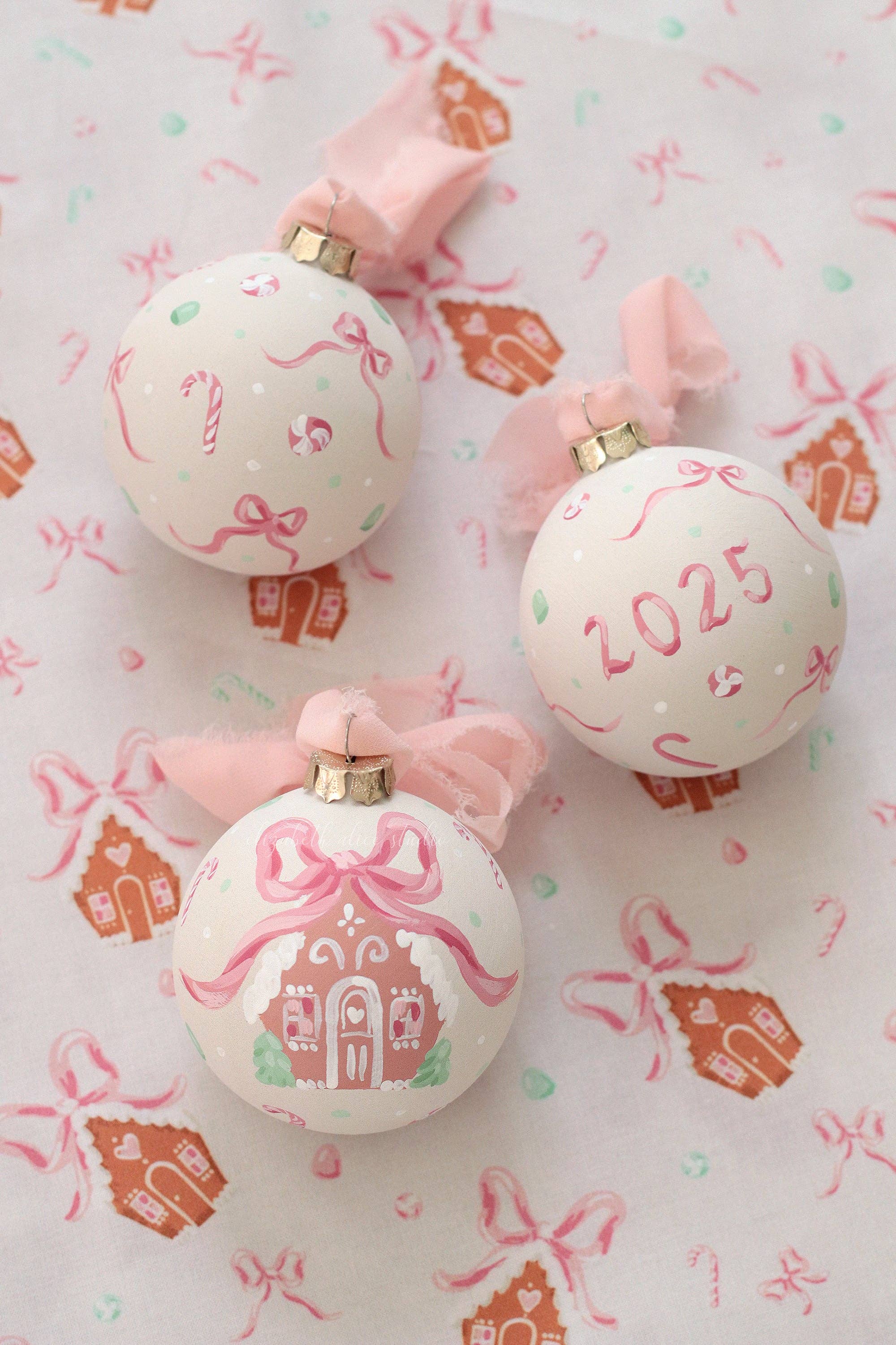 Pink gingerbread house hand-painted ornament: No year (bows and candy on reverse)