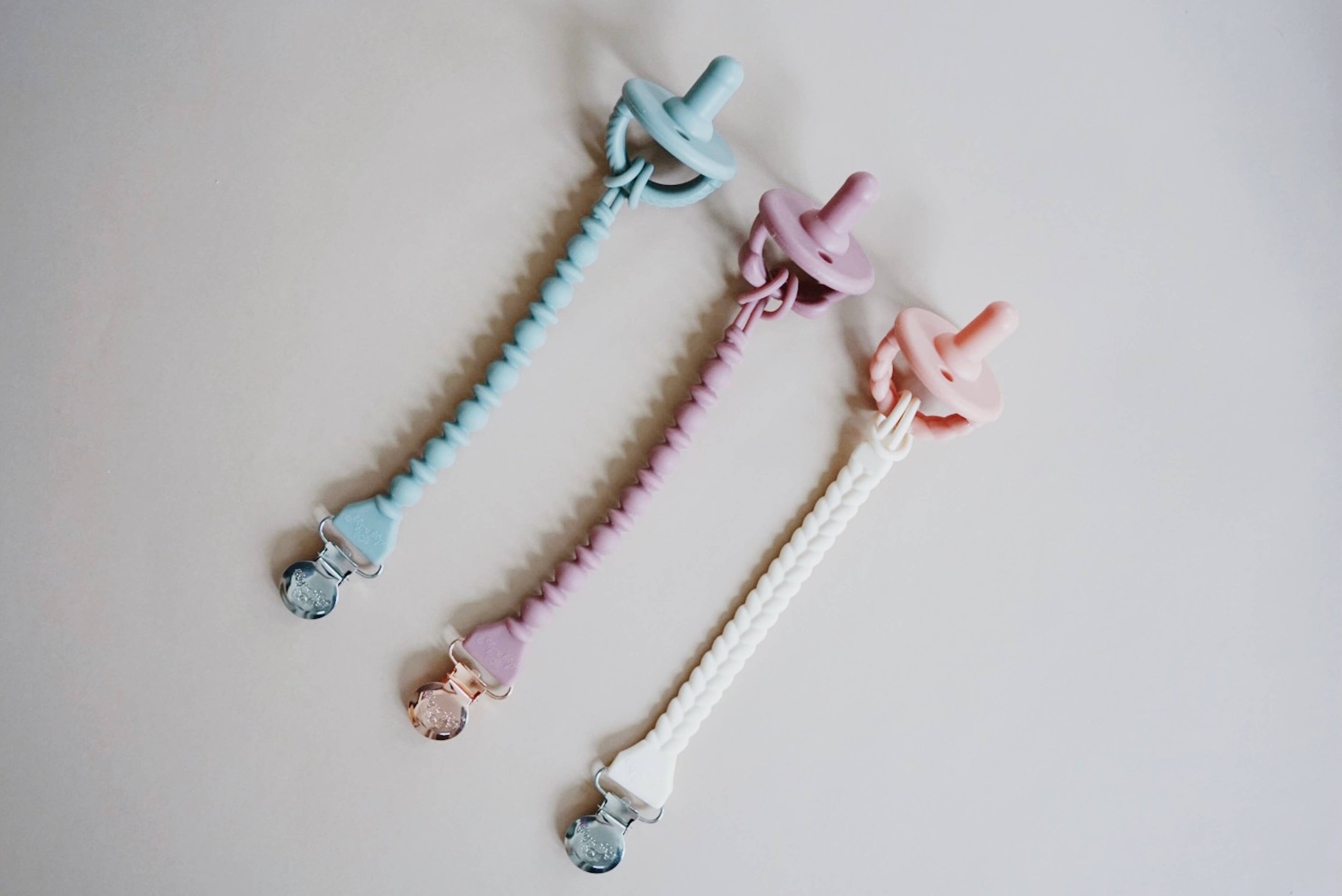 Sweetie Soother™ Pacifier Sets (2-pack): Toast + Buttercream Braids
