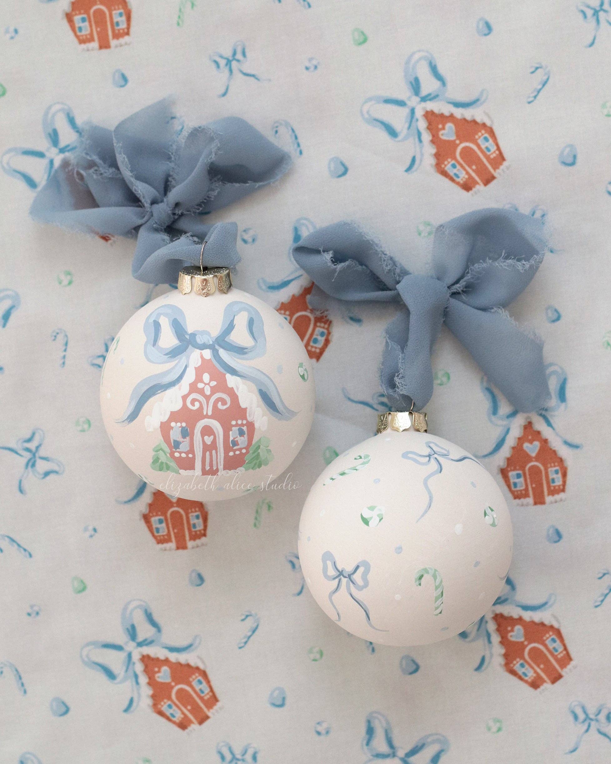 Blue gingerbread house hand-painted ornament: No year (bows and candy on reverse)