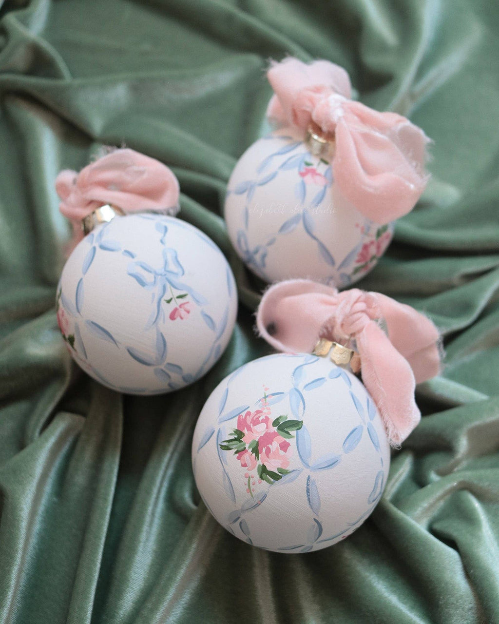 Ribbon trellis and rose hand-painted ornament