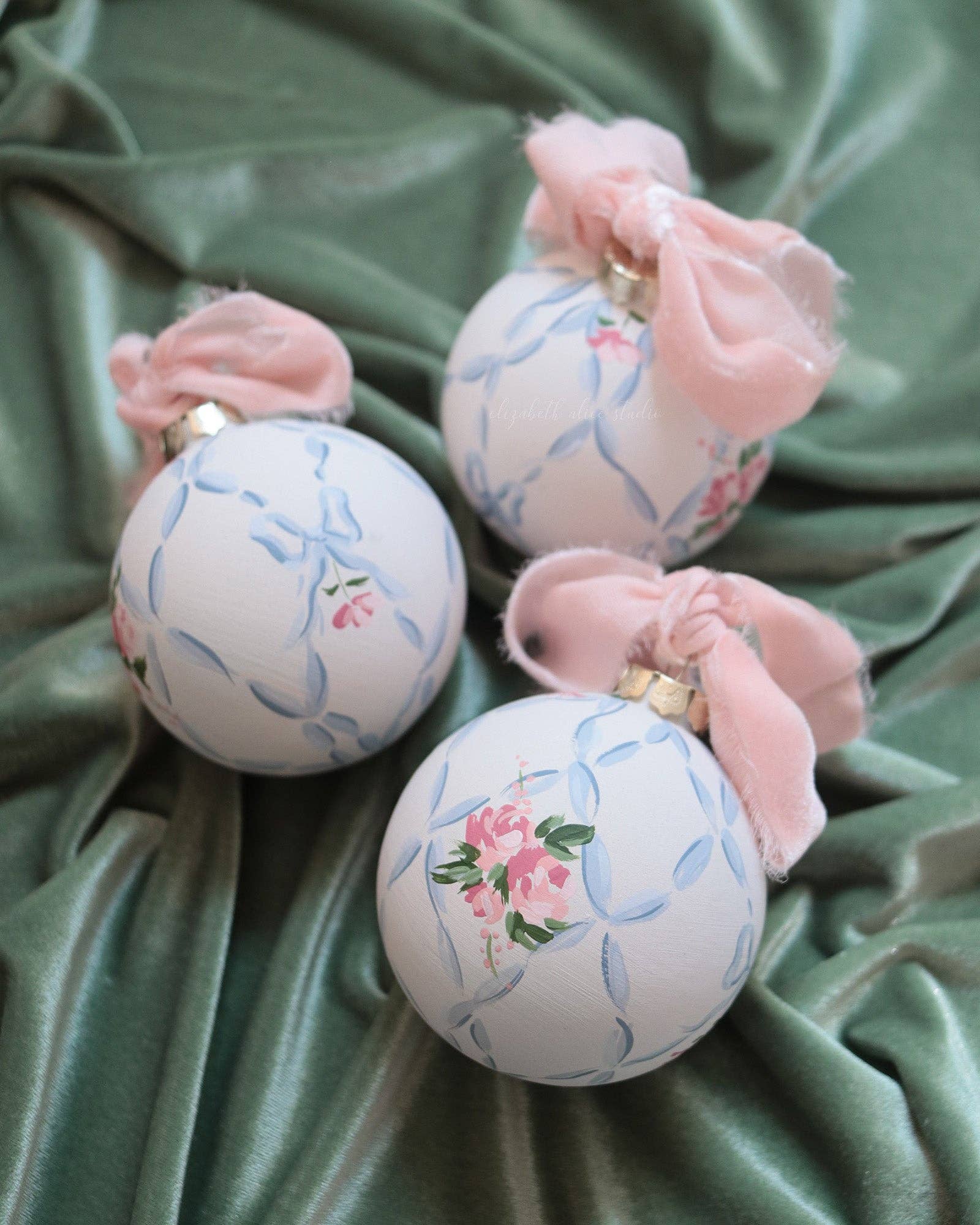 Ribbon trellis and rose hand-painted ornament